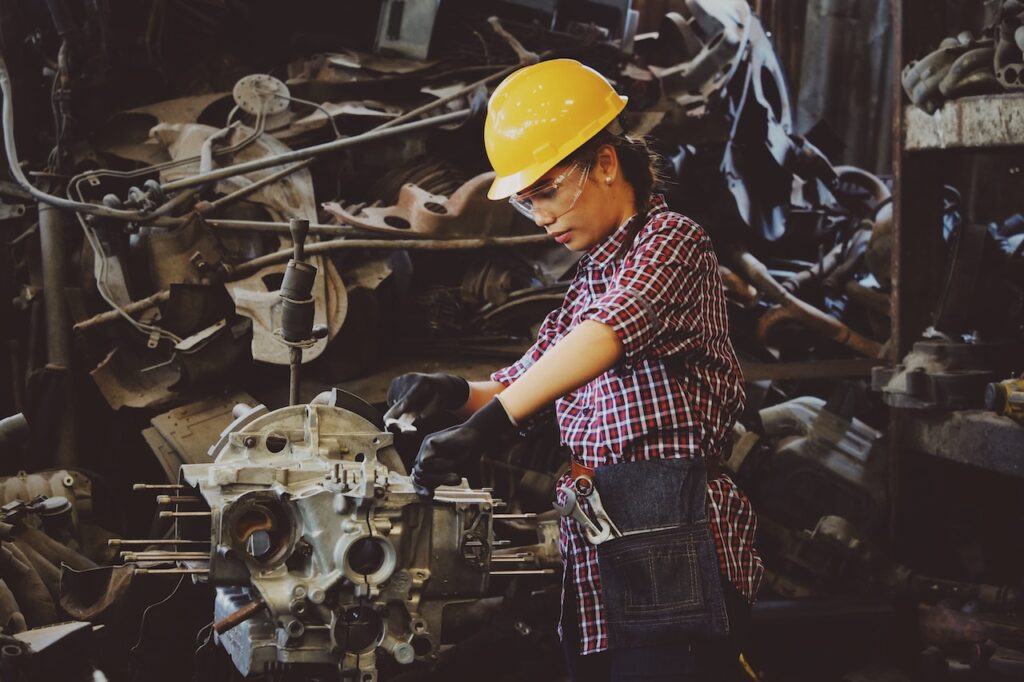 This is the picture of manufacturing worker on the job. It's meant to illustrate how they work without ai in manufacturing.